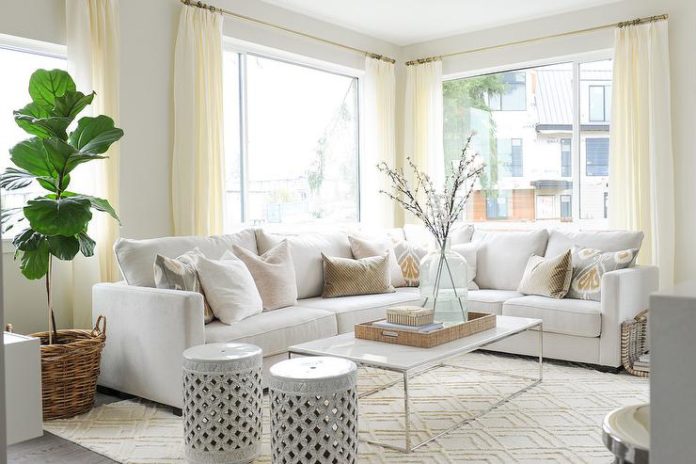 off-white-sectional-bansuri-ikat-pillow-marble-top-box-frame-coffee-table