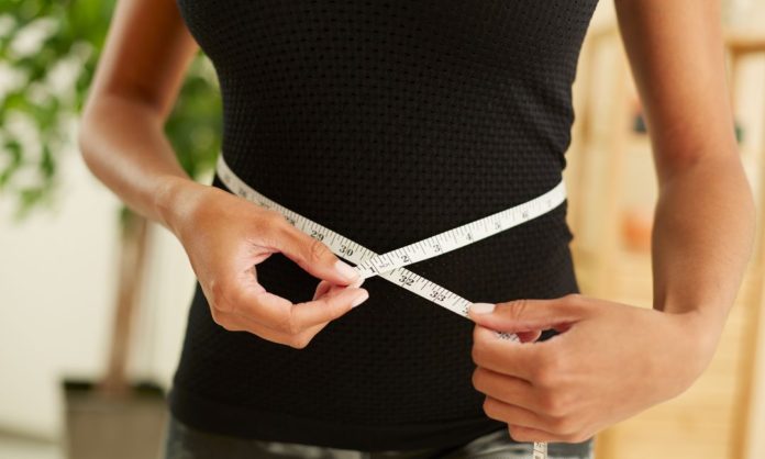 Closeup_of_woman_measuring_waist_jpeg-1080x648