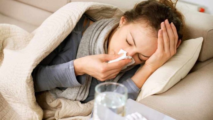 sick-woman-flu-cold-tissue-headache-16-x-9-1024x576