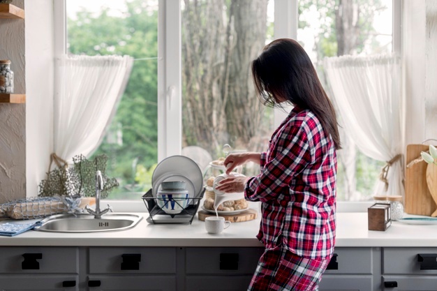 side-view-young-woman-preparing-tea_23-2148586184
